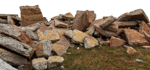 The ruins of concrete and brick rubble with green and dry grass ground on white background
