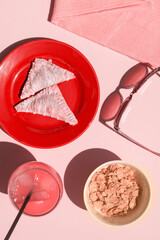 A nutella Two hand pies on a red plate with a glass