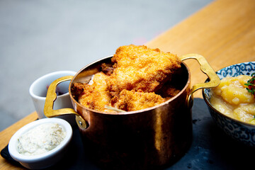 Delicious fried chicken wings with sauce