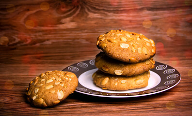 Homemade baking. Shortbread cookies with peanuts on a wooden table.