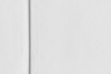 Cardboard gray texture close-up. Light old paper background. Grunge concrete wall. Vintage blank wallpaper.