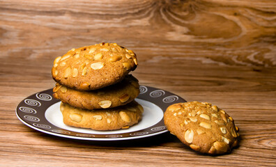 Homemade baking. Shortbread cookies with peanuts on a wooden table.