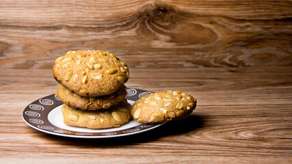 Homemade baking. Shortbread cookies with peanuts on a wooden table.