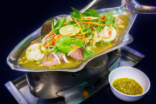quid steamed with lime,Thai food , hot and spicy, Most popular dish in Thailand.