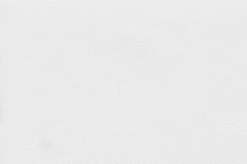 Cardboard gray texture close-up. Light old paper background. Grunge concrete wall. Vintage blank wallpaper.