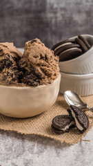 sweet milk and oreo ice cream gray background ready to eat