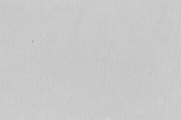 Cardboard gray texture close-up. Light old paper background. Grunge concrete wall. Vintage blank wallpaper.