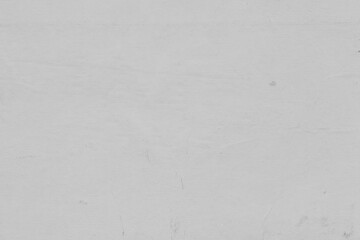 Cardboard gray texture close-up. Light old paper background. Grunge concrete wall. Vintage blank wallpaper.