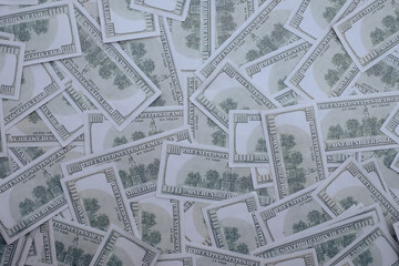 Group of money stack of 100 US dollars banknotes a lot of the background texture