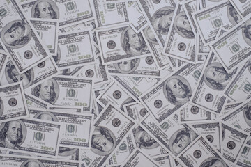 Group of money stack of 100 US dollars banknotes a lot of the background texture