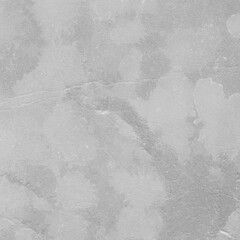 Cardboard gray texture close-up. Light old paper background. Grunge concrete wall. Vintage blank wallpaper.