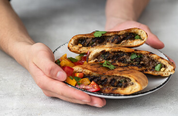 Arayes- pita bread filled with a mixture of minced meat with different spices