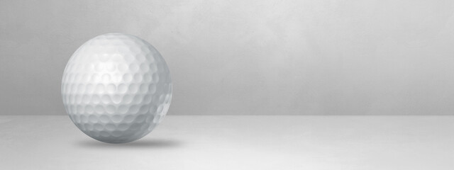 White golf ball on a blank studio banner