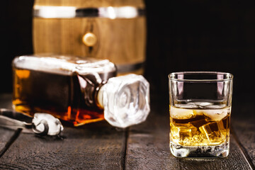 glass of aged whiskey, grain distilled alcohol, with malt, aged in barrels
