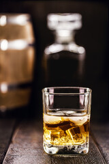 glass of aged whiskey, grain distilled alcohol, with malt, aged in barrels