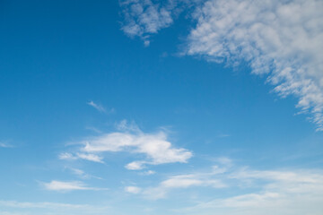 Natural clear blue sky with some clouds for background or backdrop freedom concept