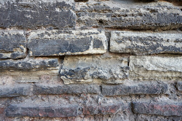 Old stone bricks wall texture close up