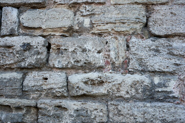 Old stone bricks wall texture close up