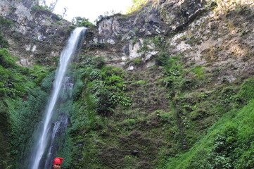 high and heavy waterfall in Malang city: Indonesia - 12 August 2019