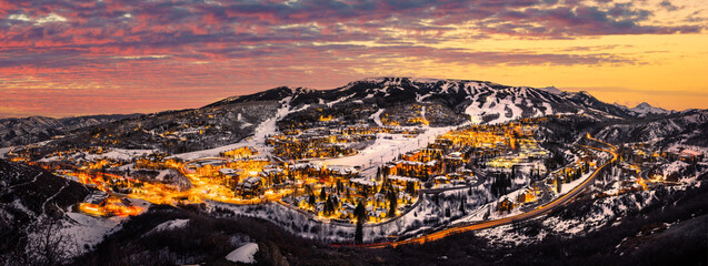 Snowmass Village with sunset and ski slopes  - obrazy, fototapety, plakaty