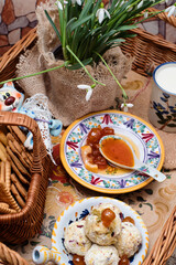 Romantic breakfast to bed - delicious fresh boursin cheese with fruits and nuts, crispy pastry, farm milk and sweet cherry jam