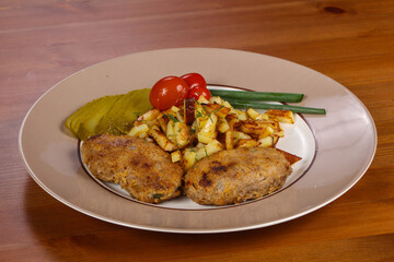 Homemade cutlet with roasted potato