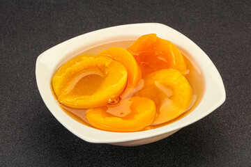 Marinated peaches fruit in the bowl