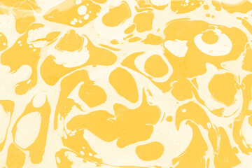 Yellow luxury marble ink texture on watercolor paper background. Marble stone image. Bath bomb effect. Psychedelic biomorphic art.