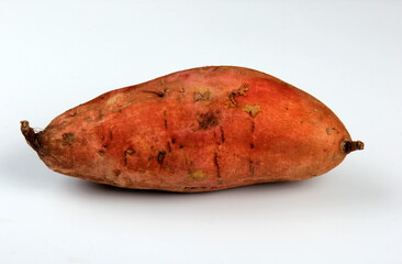 Sweet potatoes, batata isolated on white background. Ipomoea batatas.