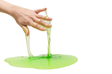 Green slime toy in woman hand isolated on white background.