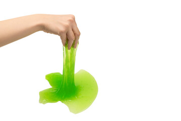 Green slime toy in woman hand isolated on white background.