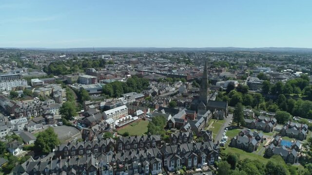 Aerial of the Exeter skyline. Residential, commercial and religious buildings