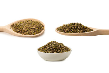Oregano in a bowl isolated.