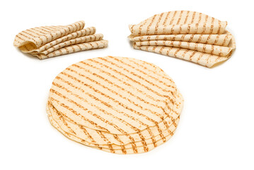 Grilled pitta bread isolated on white background.