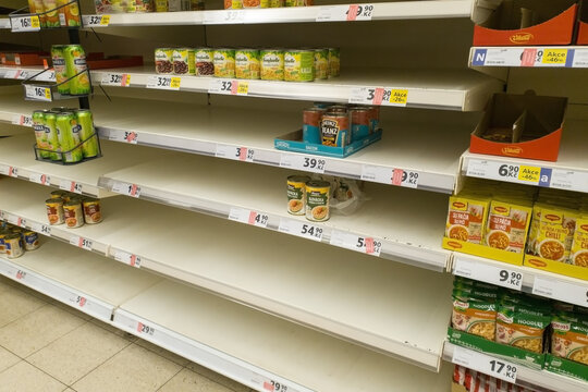 Prague, Czech Republic - February 28, 2020: Empty Shelves In Tesco Supermarket. Shortage Of Products Supplies During Panic Of Corona Virus