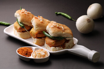 Bombay vada paav is an indian burger. Potato patty is deep fried in gram flour or besan batter and it is served hot with paav or bun like sandwich. Its available and liked all over India