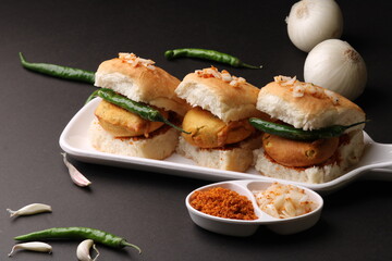 Bombay vada paav is an indian burger. Potato patty is deep fried in gram flour or besan batter and it is served hot with paav or bun like sandwich. Its available and liked all over India