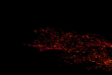Flying red fire sparks on black background overlay