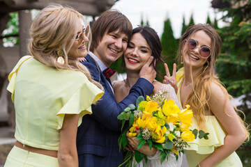 Newly married with bridesmaids