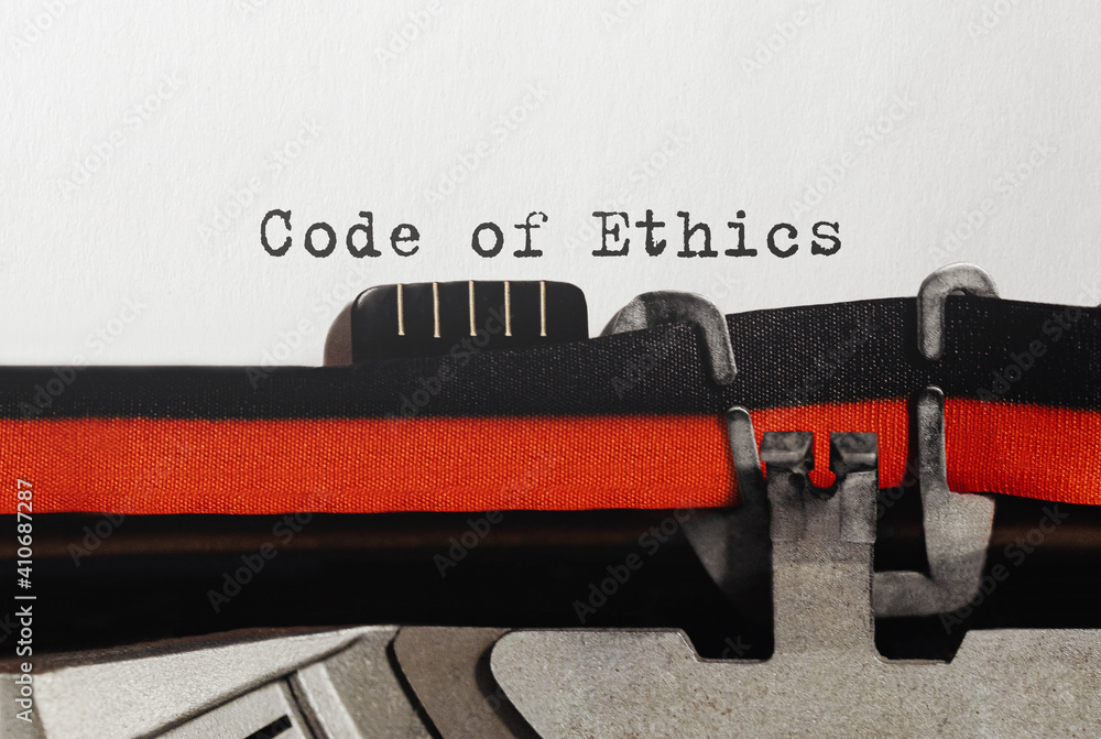 Poster text code of ethics typed on retro typewriter