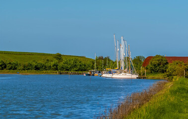 A view out to sea along the creek at Oare near Faversham, Kent on an sunny afternoon