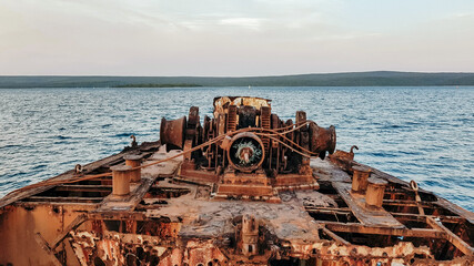 Rusty bows on abandoned ship. Sea, nautical, chain link, anchor chain.