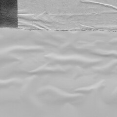  White torn paper collage close-up. Texture made from various paper and cardboard parts. Damaged old paper background. Vintage blank wallpaper. Material design backdrop.