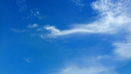 Naklejka na ściany i meble clear sky background with few clouds in the countryside