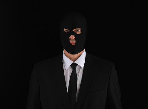 portrait of an unknown in a black mask