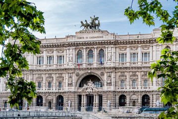 Fototapeta na wymiar The Palace of Justice, seat of the Supreme Court of Cassation and the Judicial Public Library, in late Renaissance and Baroque style, located in the Prati district, Rome, Italy