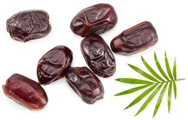 date fruits with green leaves isolated on white background. clipping path. top view