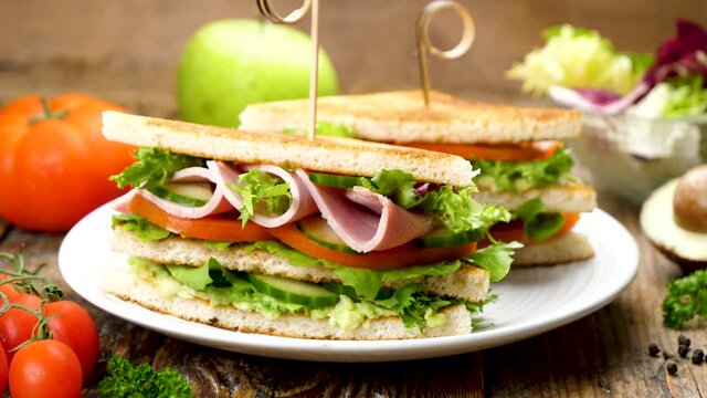 toasted bread slices with ham and vegetables- sandwich