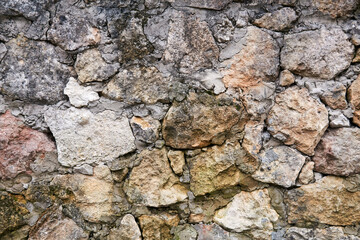background, texture - antique rough masonry from natural stone