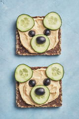 Funny bear toast with cucumber and hummus toasts
